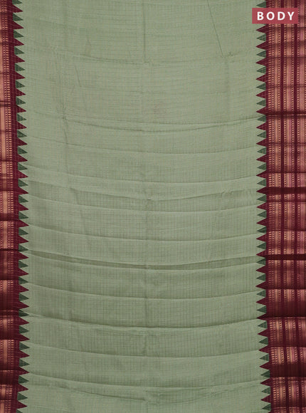 Semi raw silk saree pastel green and maroon with allover zari checked pattern and temple design zari woven border