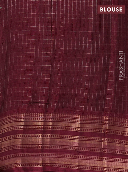 Semi raw silk saree pastel green and maroon with allover zari checked pattern and temple design zari woven border