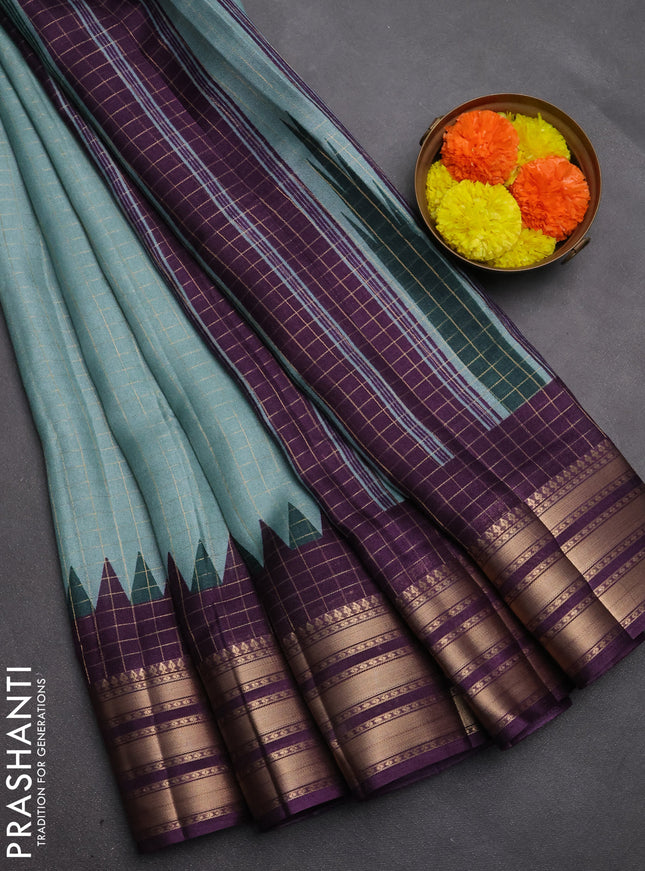 Semi raw silk saree teal green and deep purple with allover zari checked pattern and temple design zari woven border