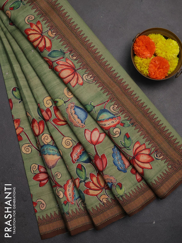 Semi raw silk saree elaichi green and coffee brown with mirror embroidery buttas and long kalamkari printed embroidery border