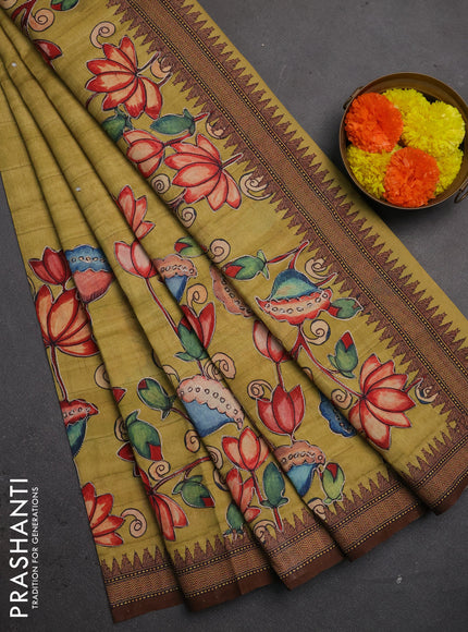 Semi raw silk saree mustard yellow and coffee brown with mirror embroidery buttas and long kalamkari printed embroidery border