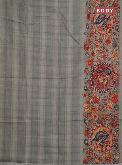 Semi raw silk saree pastel green shade with plain body and long kalamkari printed embroidery border
