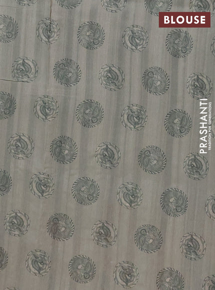 Semi raw silk saree pastel green shade with plain body and long kalamkari printed embroidery border