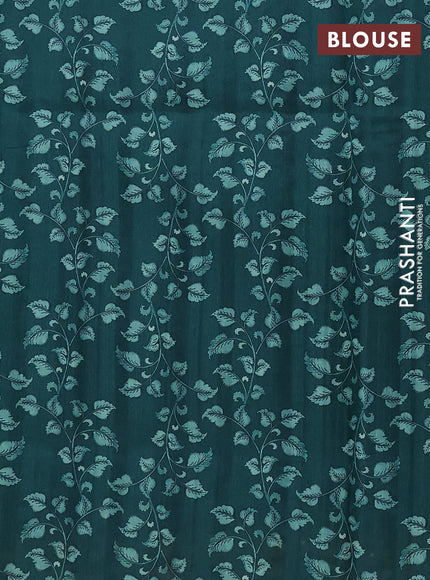 Semi raw silk saree green with plain body and long kalamkari printed embroidery border