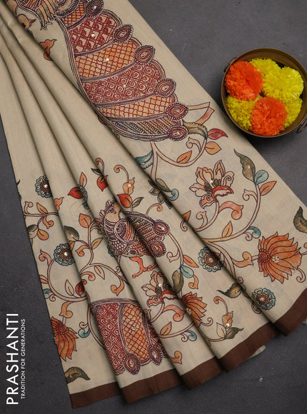 Semi raw silk saree beige and coffee brown with plain body and long kalamkari printed embroidery border