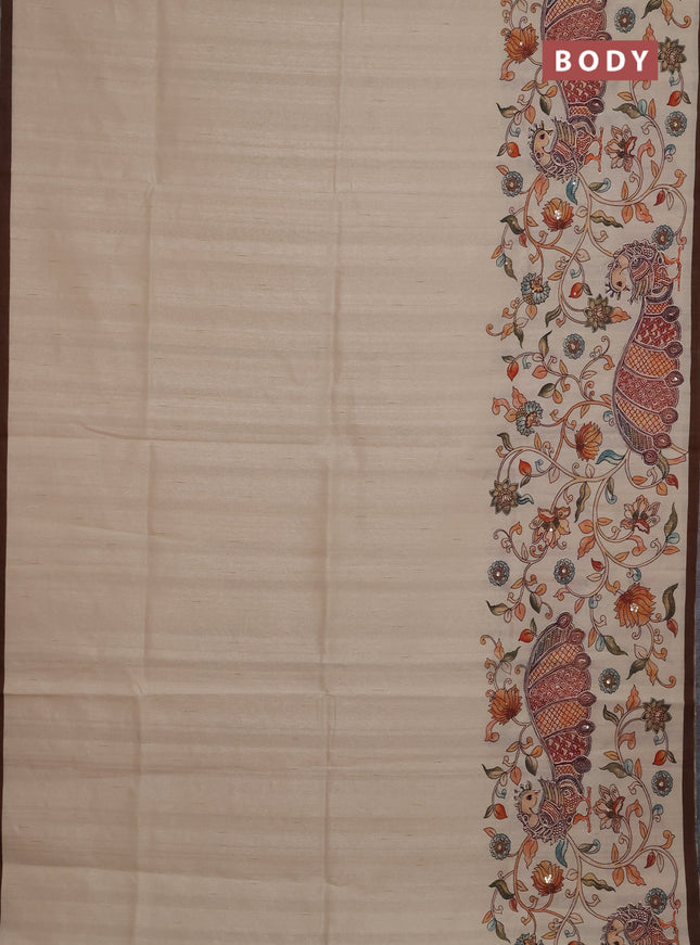 Semi raw silk saree beige and coffee brown with plain body and long kalamkari printed embroidery border