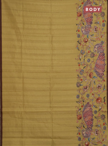 Semi raw silk saree mustard yellow and coffee brown with plain body and long kalamkari printed embroidery border