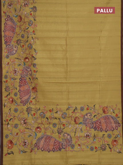 Semi raw silk saree mustard yellow and coffee brown with plain body and long kalamkari printed embroidery border