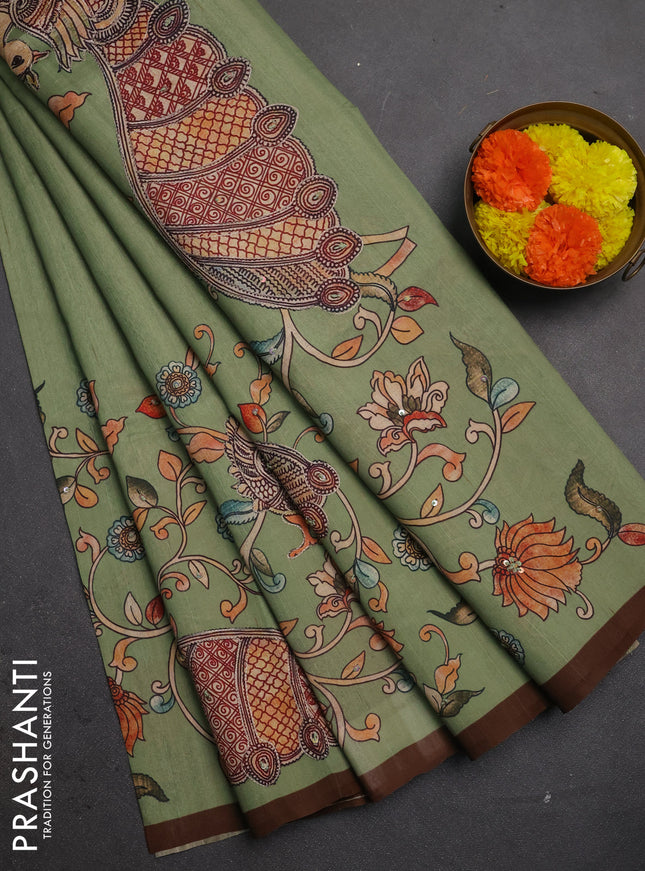 Semi raw silk saree pastel green and coffee brown with plain body and long kalamkari printed embroidery border