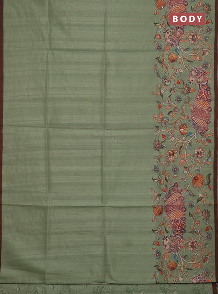 Semi raw silk saree pastel green and coffee brown with plain body and long kalamkari printed embroidery border