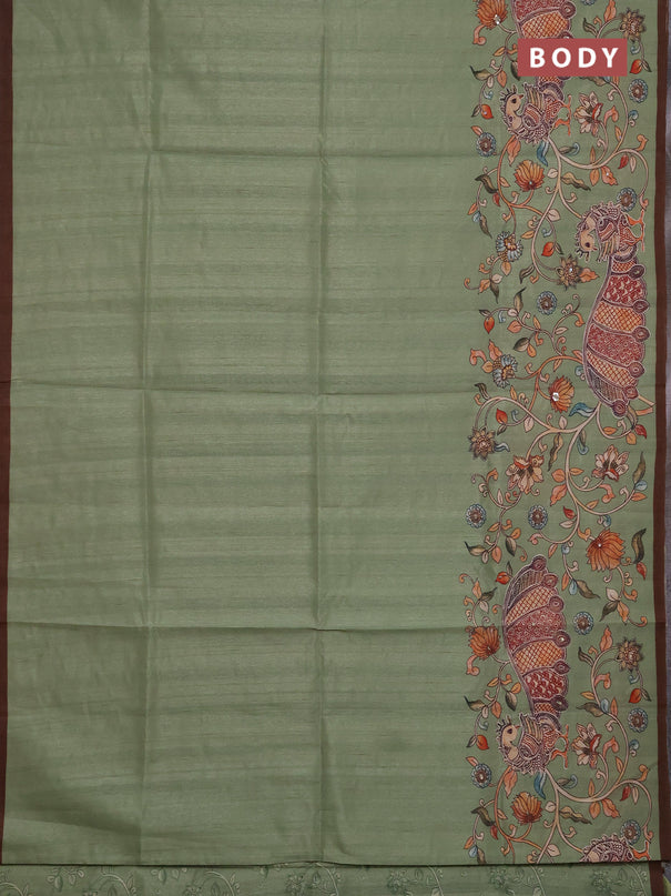 Semi raw silk saree pastel green and coffee brown with plain body and long kalamkari printed embroidery border