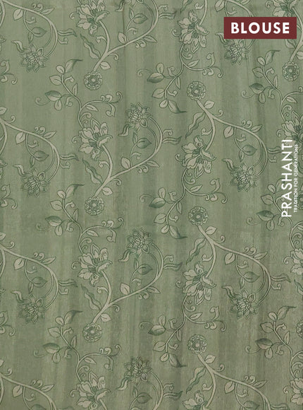 Semi raw silk saree pastel green and coffee brown with plain body and long kalamkari printed embroidery border