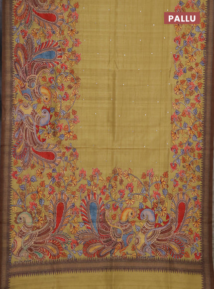 Semi raw silk saree mustard yellow and coffee brown with mirror embroidery buttas and long kalamkari printed embroidery border