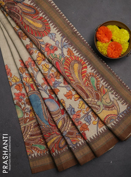 Semi raw silk saree beige and coffee brown with mirror embroidery buttas and long kalamkari printed embroidery border