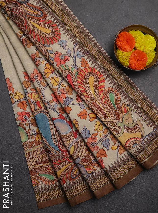 Semi raw silk saree beige and coffee brown with mirror embroidery buttas and long kalamkari printed embroidery border