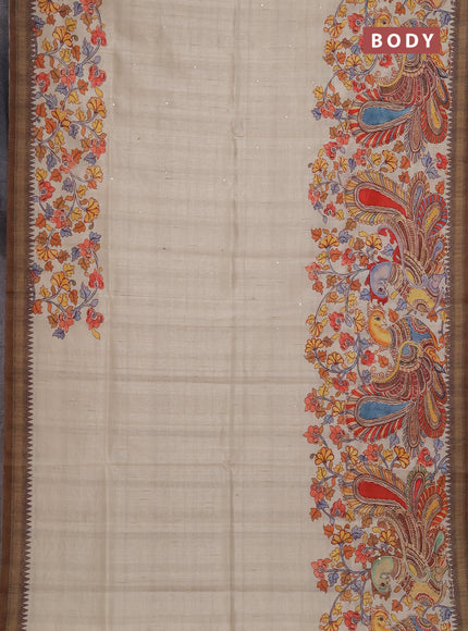 Semi raw silk saree beige and coffee brown with mirror embroidery buttas and long kalamkari printed embroidery border