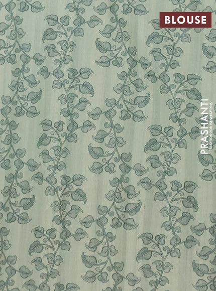 Semi raw silk saree pista green with plain body and long kalamkari printed embroidery border