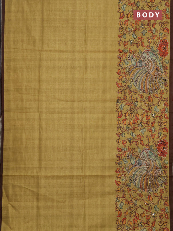 Semi raw silk saree mustard yellow and coffee brown with plain body and long kalamkari printed embroidery border