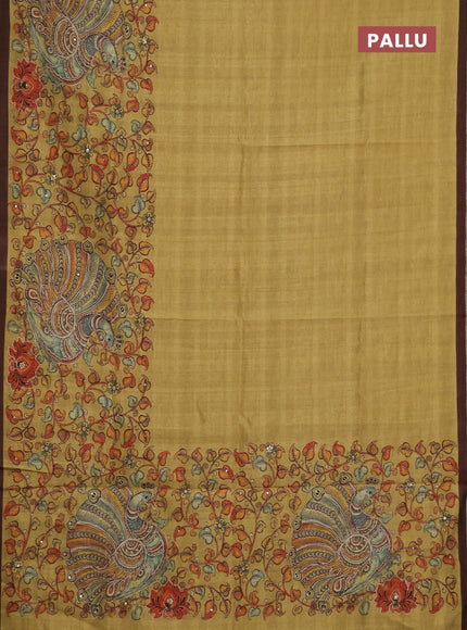 Semi raw silk saree mustard yellow and coffee brown with plain body and long kalamkari printed embroidery border