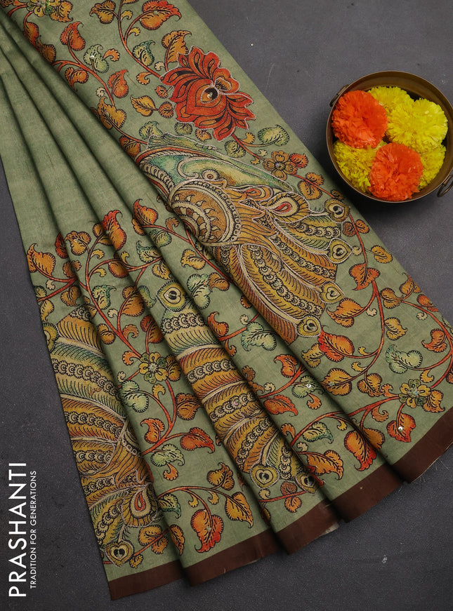 Semi raw silk saree pastel green and coffee brown with plain body and long kalamkari printed embroidery border