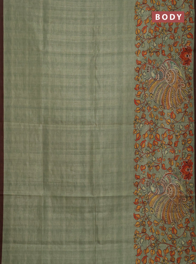 Semi raw silk saree pastel green and coffee brown with plain body and long kalamkari printed embroidery border