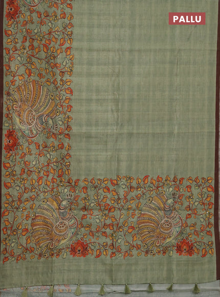 Semi raw silk saree pastel green and coffee brown with plain body and long kalamkari printed embroidery border