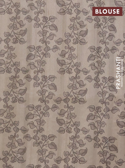 Semi raw silk saree beige and coffee brown with plain body and long kalamkari printed embroidery border