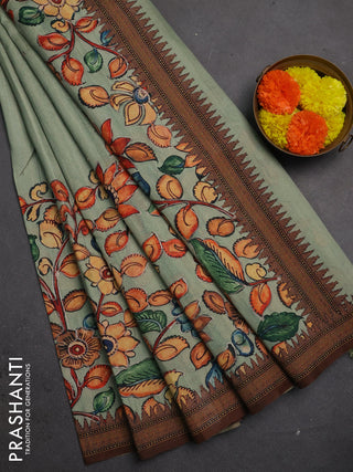 Semi raw silk saree pastel green and coffee brown with mirror embroidery buttas and long kalamkari printed embroidery border