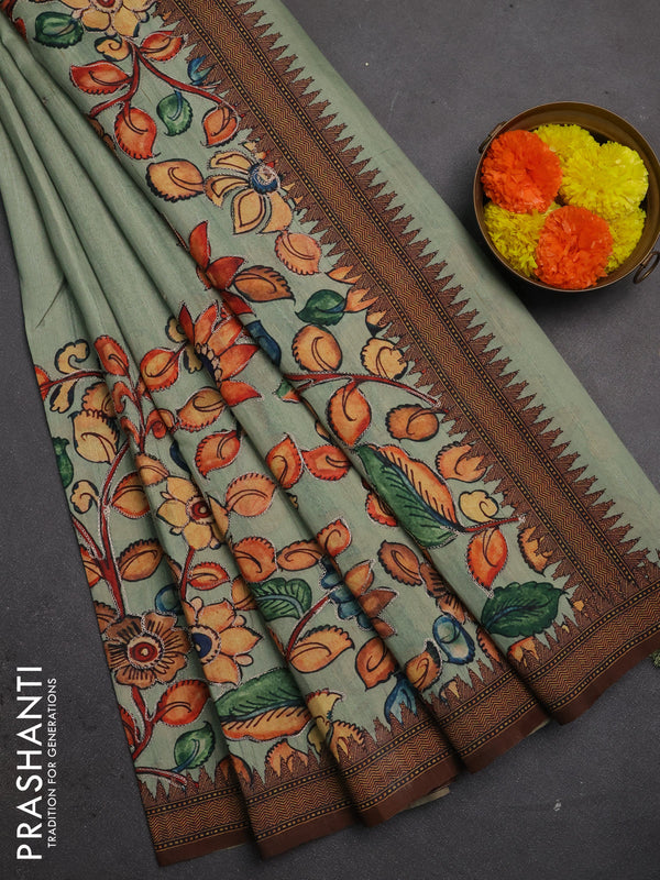 Semi raw silk saree pastel green and coffee brown with mirror embroidery buttas and long kalamkari printed embroidery border