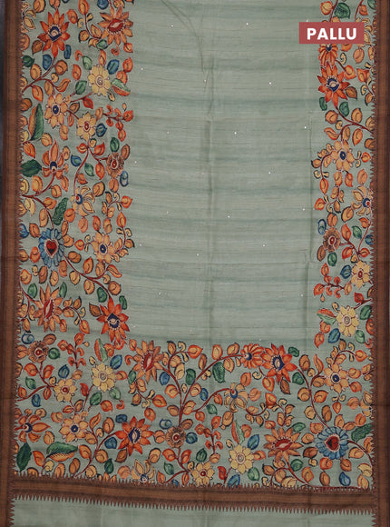 Semi raw silk saree pastel green and coffee brown with mirror embroidery buttas and long kalamkari printed embroidery border