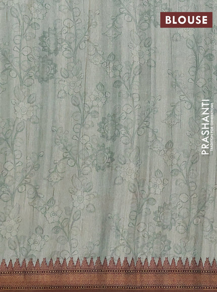 Semi raw silk saree pastel green and coffee brown with mirror embroidery buttas and long kalamkari printed embroidery border