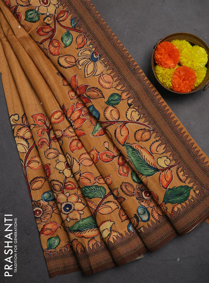 Semi raw silk saree rustic orange shade and coffee brown with mirror embroidery buttas and long kalamkari printed embroidery border