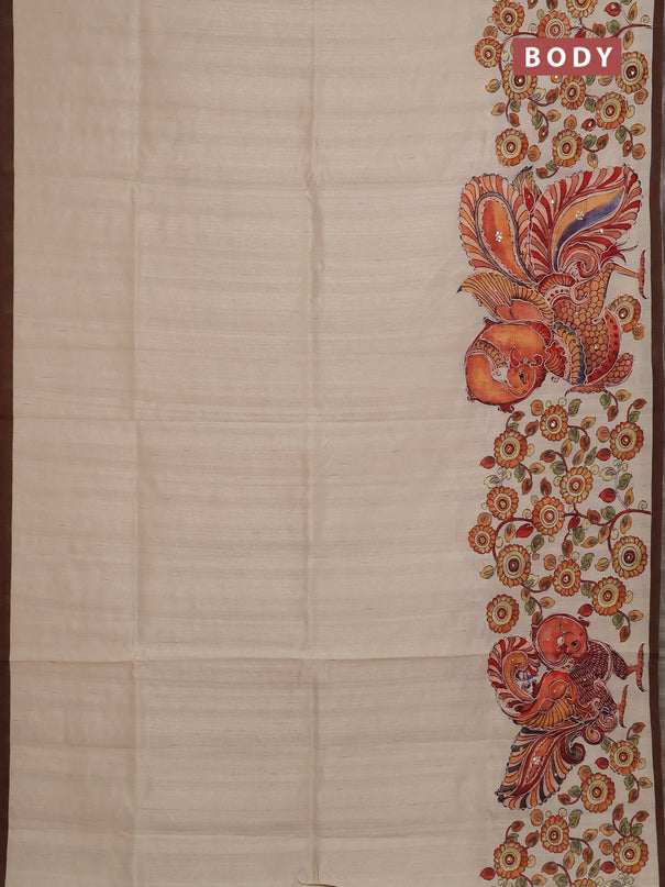Semi raw silk saree beige and coffee brown with plain body and long kalamkari printed embroidery border
