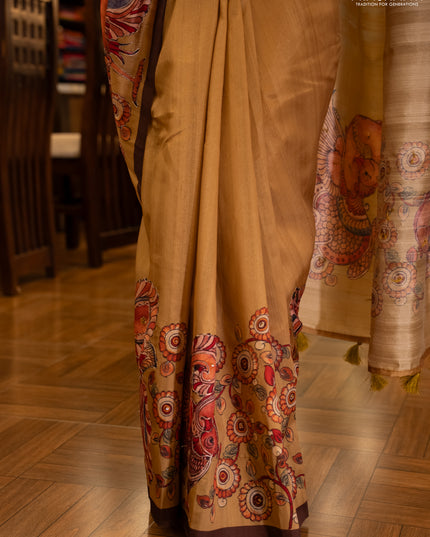 Semi raw silk saree mustard yellow and coffee brown with plain body and long kalamkari printed embroidery border