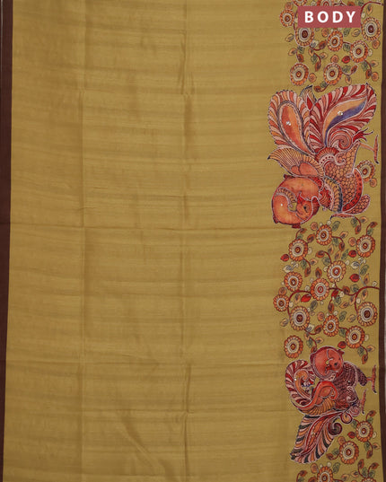 Semi raw silk saree mustard yellow and coffee brown with plain body and long kalamkari printed embroidery border