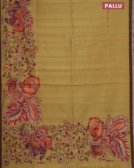 Semi raw silk saree mustard yellow and coffee brown with plain body and long kalamkari printed embroidery border