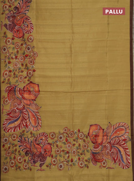 Semi raw silk saree mustard yellow and coffee brown with plain body and long kalamkari printed embroidery border