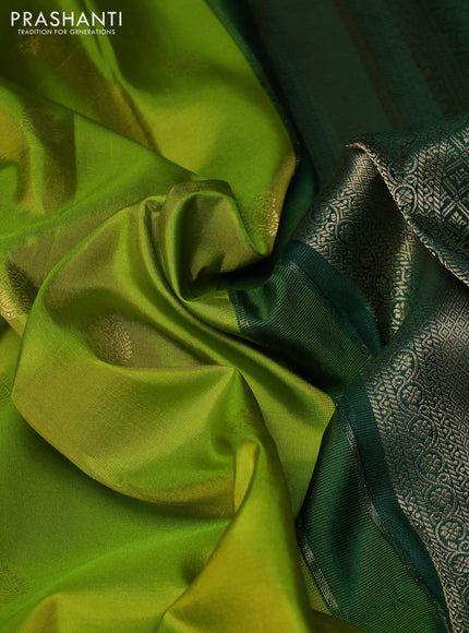 Pure gadwal silk saree light green and bottle green with zari woven buttas and temple design zari woven border