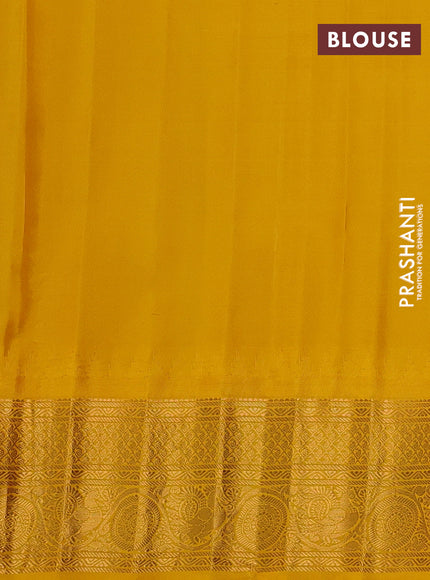 Pure gadwal silk saree purple and yellow with zari woven buttas and temple design zari woven border