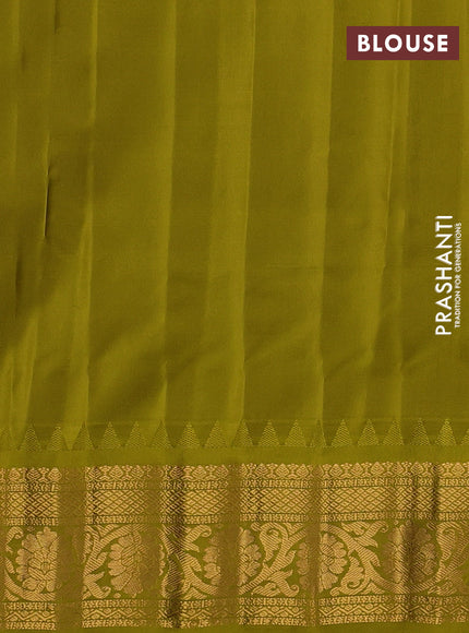 Pure gadwal silk saree cream and mehendi green with allover zari woven buttas and temple design zari woven border