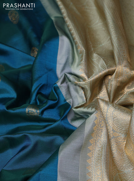 Pure gadwal silk saree dual shade of green and pastel green with allover zari woven buttas and temple design zari woven border