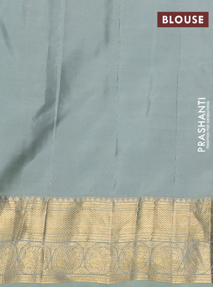 Pure gadwal silk saree dual shade of green and pastel green with allover zari woven buttas and temple design zari woven border