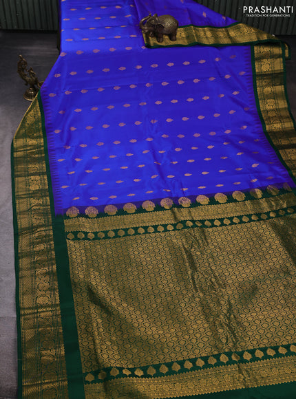 Pure gadwal silk saree royal blue and bottle green with allover zari woven buttas and temple design zari woven border