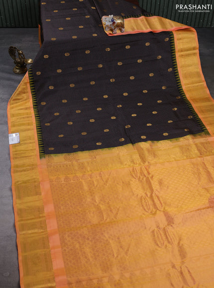 Pure gadwal silk saree black and peach orange with allover checks & zari woven buttas and temple design zari woven border