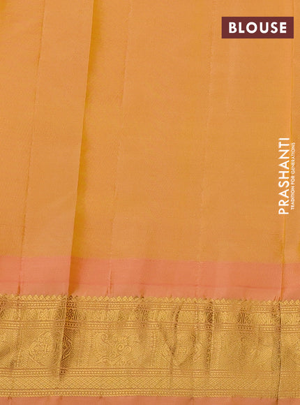Pure gadwal silk saree black and peach orange with allover checks & zari woven buttas and temple design zari woven border