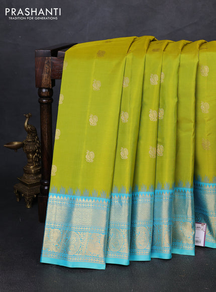 Pure gadwal silk saree lime green and teal blue with allover annam zari woven border and temple design zari woven border