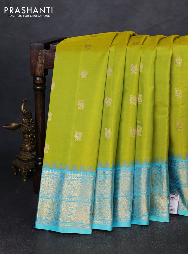 Pure gadwal silk saree lime green and teal blue with allover annam zari woven border and temple design zari woven border