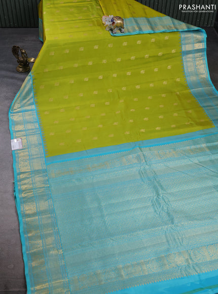 Pure gadwal silk saree lime green and teal blue with allover annam zari woven border and temple design zari woven border