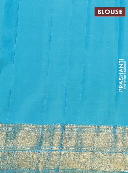 Pure gadwal silk saree lime green and teal blue with allover annam zari woven border and temple design zari woven border