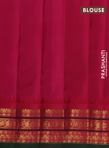 Pure gadwal silk saree peacock green and tomato pink with allover zari woven buttas and temple design zari woven border